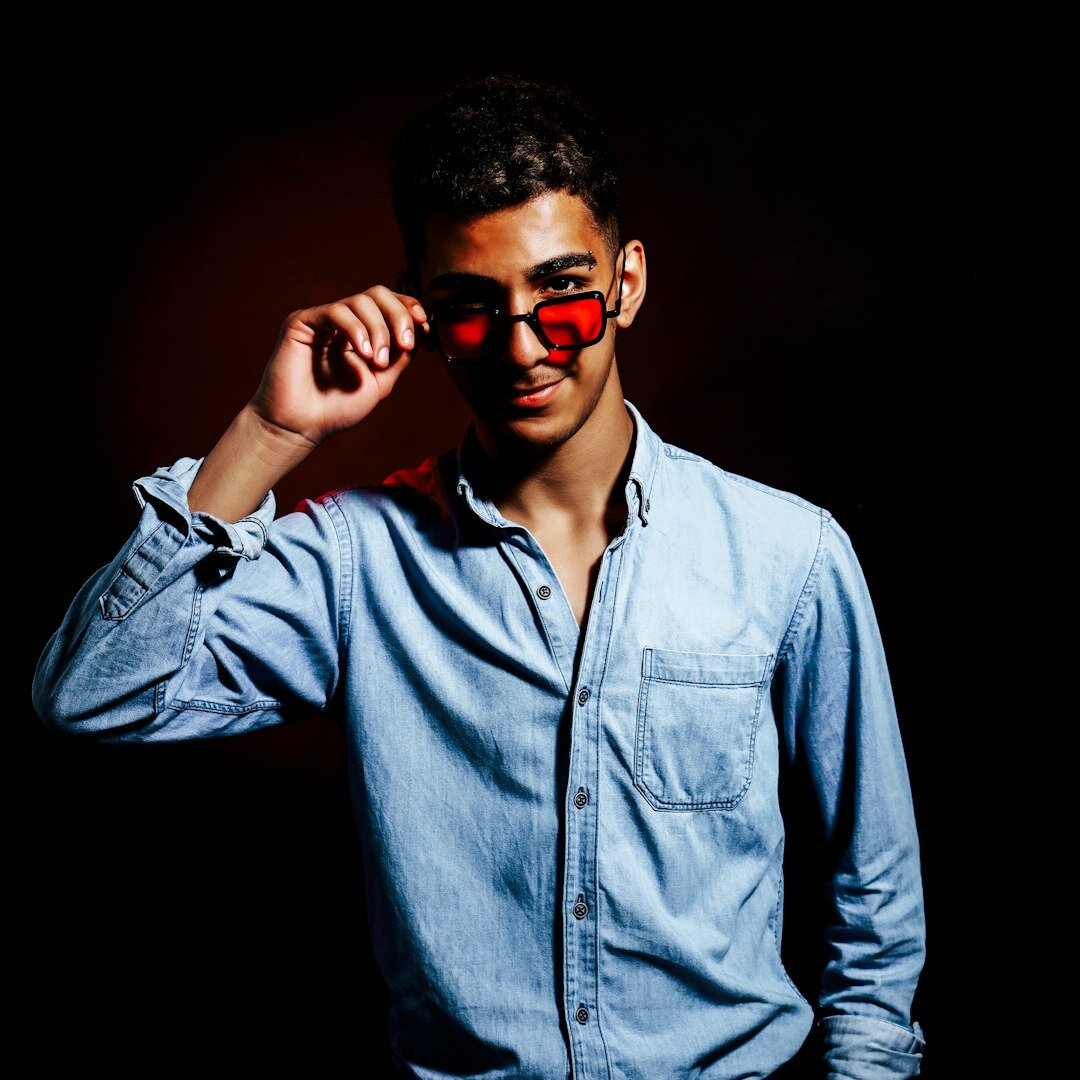 Portrait of a man camera operator with glasses